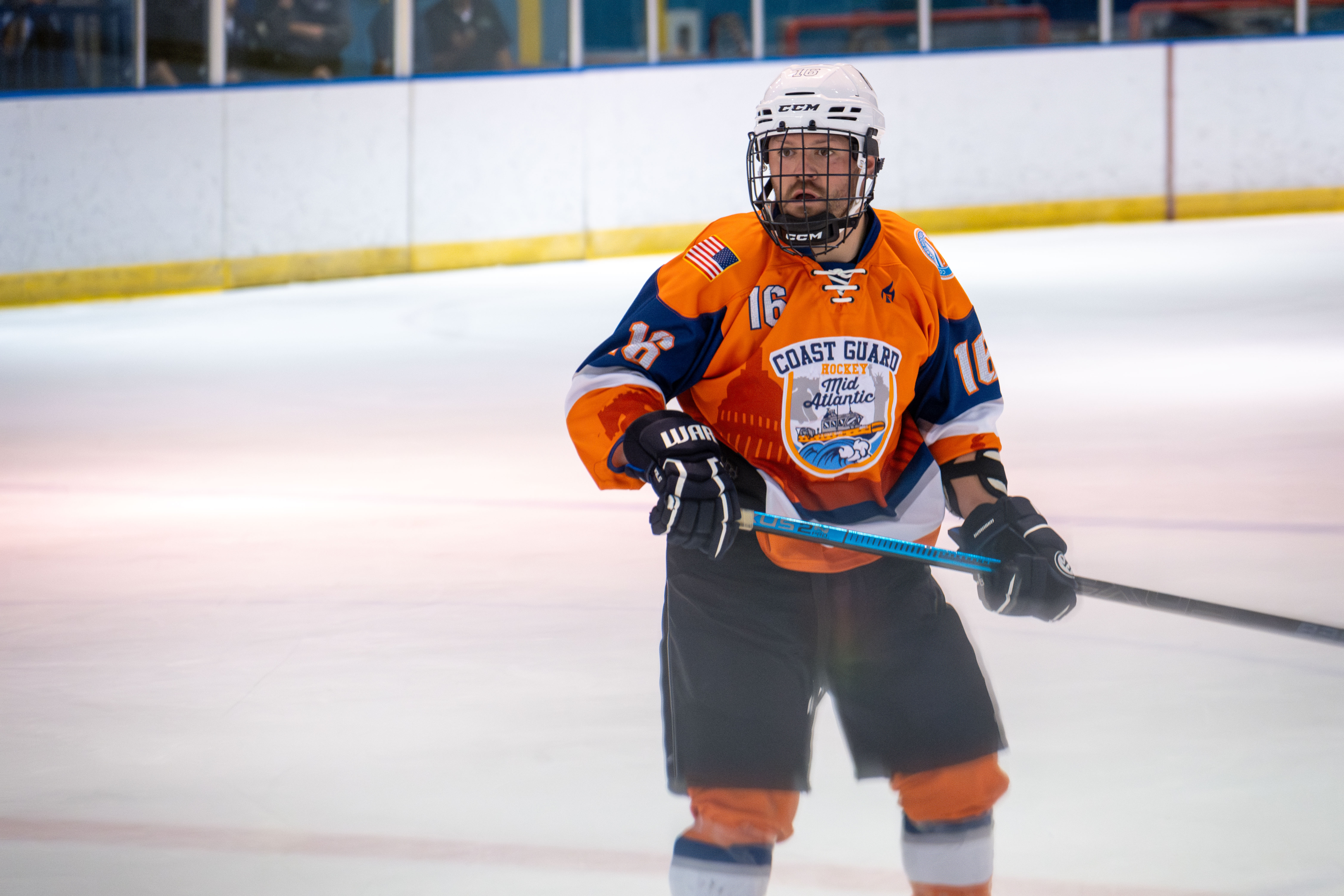 A Coast Guard Hockey team member on the Mid-Atlantic team skates on the ice in the 2024 Tunnels to Towers Heroes Cup on Sept. 14, 2024, in Morristown, New Jersey. The Coast Guard Hockey team claimed victory in the 2024 Tunnels to Towers Heroes Cup representing Coast Guard active duty, reserves, and veterans while raising funds for the Tunnel to Towers Foundation. (Coast Guard photo by Petty Officer 2nd Class Sydney Phoenix)