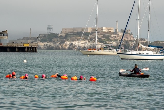 Swimmers from Take the Rock Veteran Swim Challenge train in Aquatic Park Cove, San Francisco, Sept. 5, 2021. Photo by James Leedy
