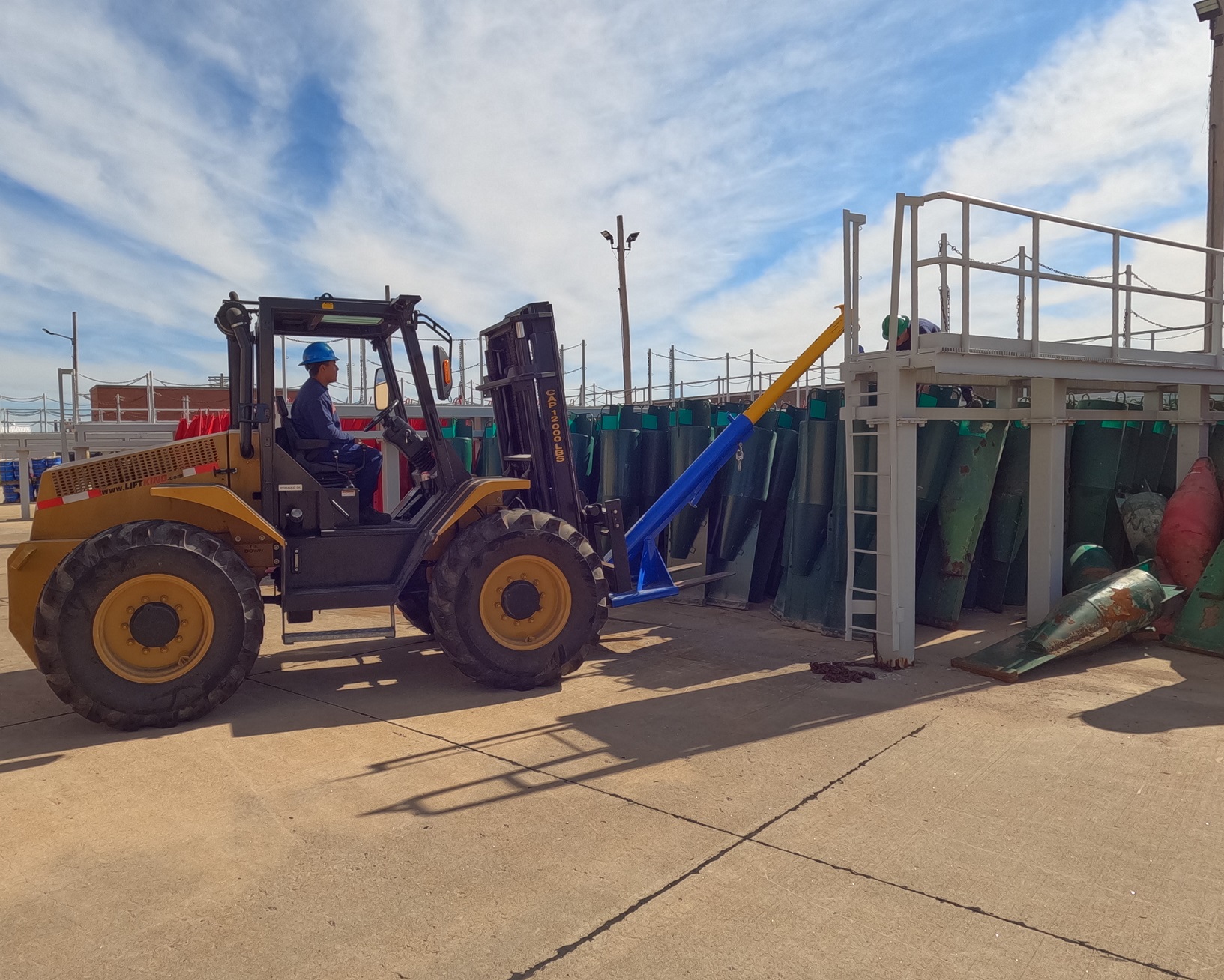 A crewmember from the Coast Guard Cutter Gasconade unloads aids to navigation equipment using a forklift with a jib boom Sep. 26, 2022. The work was performed during a Support Equipment Requirements Generation and Evaluation (SERGE) event hosted by the Support Equipment Program. (USCG image)